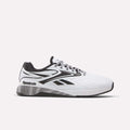 The Reebok Nano X5 Edge Training Shoes feature a white and black design with a black sole, black and gray laces, and Reebok logos on the side and heel. Engineered for peak performance, they're displayed on a plain white background.
