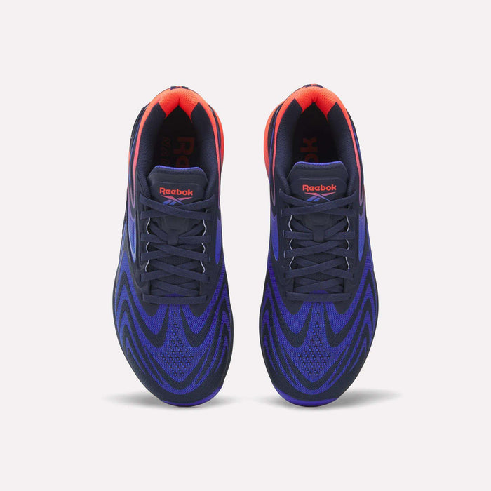 A pair of Reebok Nano X5 Edge Training Shoes with black laces, a blue and black wavy Flexweave pattern, and red accents on the tongue and heel, seen from above on a white background.