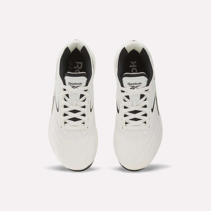 A pair of Reebok Nano X5 Edge Training Shoes in white with black accents, seen from above against a plain white background. These sneakers have white laces, display the Reebok logo on the tongue and insoles, and are constructed with flexweave material for enhanced durability—characteristic of these precision training shoes by Reebok.