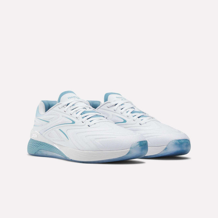 A pair of Reebok Nano X5 Edge Training Shoes in white with light blue accents and Flexweave soles, shown on a plain white background.