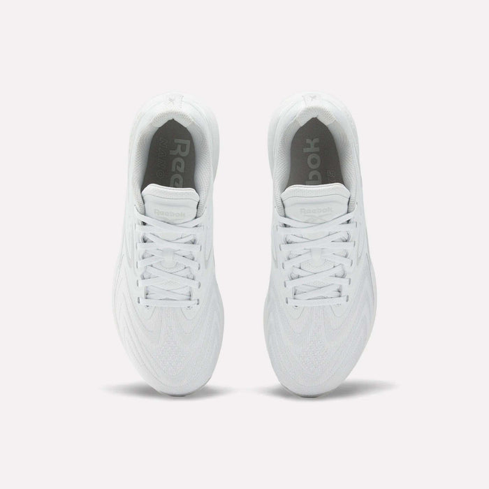 A pair of Reebok Nano X5 Edge Training Shoes in white, shown from above with visible tops, laces, and rounded toe design on a plain white background—ideal for precision training and any workout.