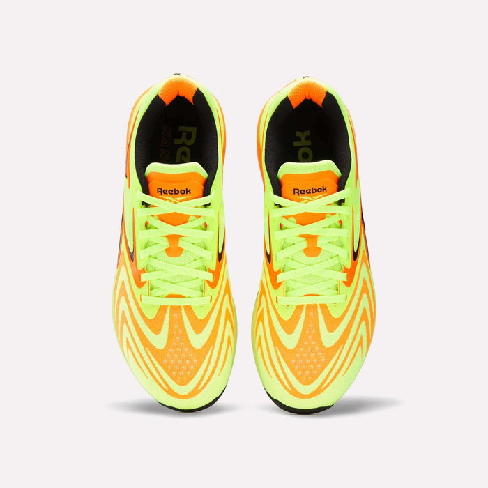 Top view of Reebok Nano X5 Edge Training Shoes with Flexweave material, bright yellow and orange wavy patterns, neon green laces, and black accents on the inner sole and heel.