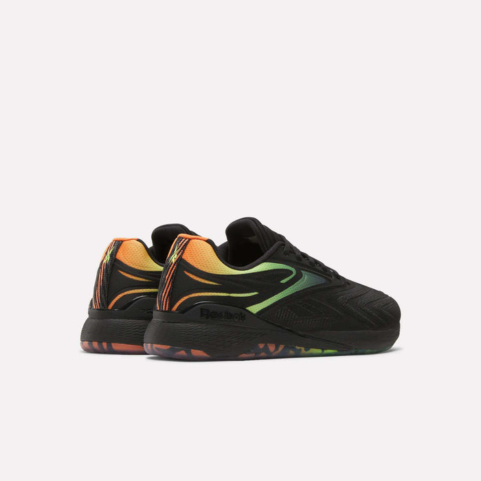 The Reebok Nano X5 Edge Training Shoes feature a black design with orange, yellow, and green gradient flame patterns on the heels and sides, a Flexweave upper, and multicolor soles—all shown against a light background.
