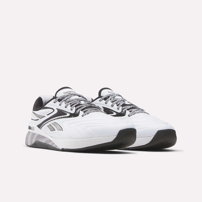 Reebok Nano X5 Edge Training Shoes in white with black and gray accents feature black-and-white patterned laces and a textured sole, shown on a plain light background for peak performance.