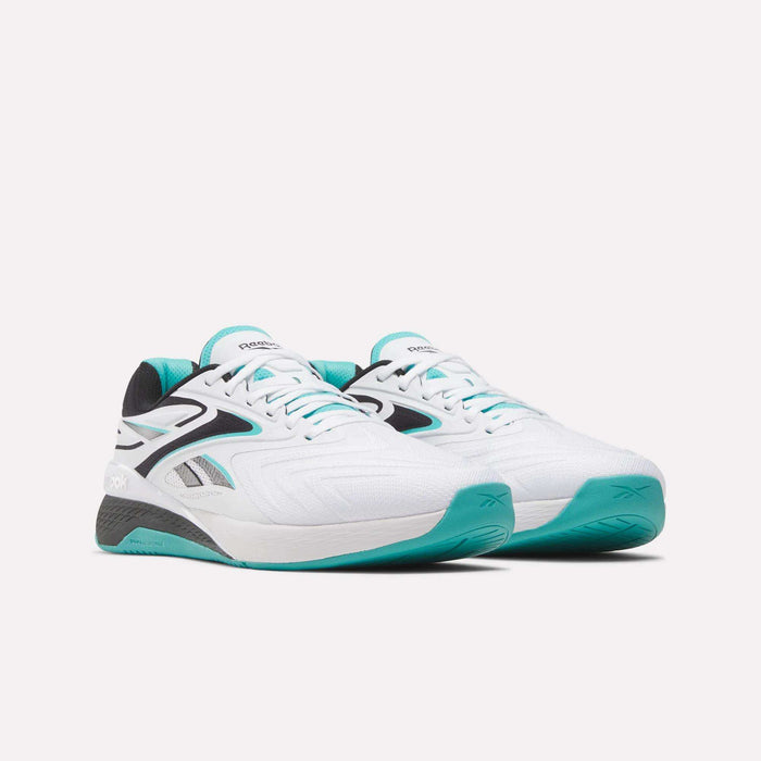 The Reebok Nano X5 Edge Training Shoes feature a chunky white design with teal accents on the soles and inner lining, plus black details—perfect for intense workout sessions, shown here against a plain white background.