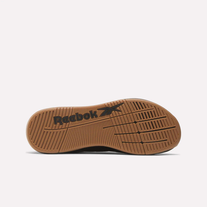 The gum outsole of the Reebok Nano X5 Edge Training Shoes features a black Reebok logo and star, a textured tread for grip, and durable Flexweave detail, all shown against a plain white background.