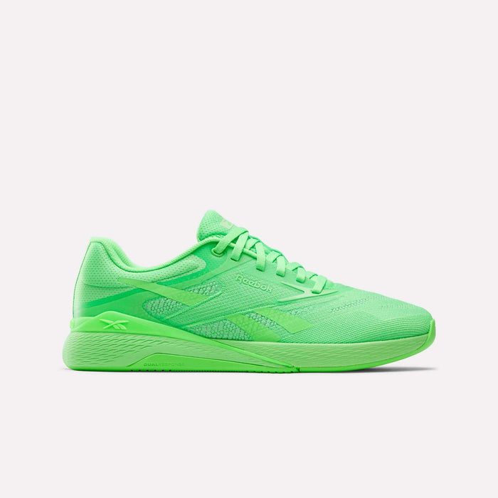 The Reebok Nano X5 Training Shoes feature a vibrant neon green mesh upper, matching laces, and a cushioned rubber sole, displayed in a side profile against a plain white background.