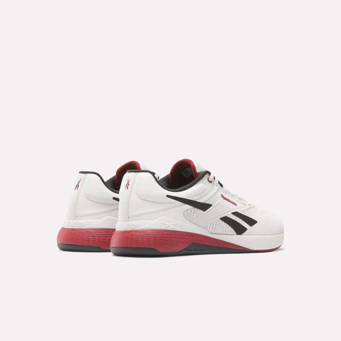 The Reebok Nano X5 Training Shoes, in white with black and red accents, feature black logo stripes on the sides and red detailing on the heel, displayed against a plain white background.
