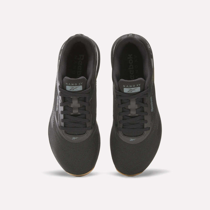 A pair of black Reebok Nano X5 training shoes viewed from above, featuring branded tongues, laces, and gum-colored outer soles—perfect for comfortable workouts.