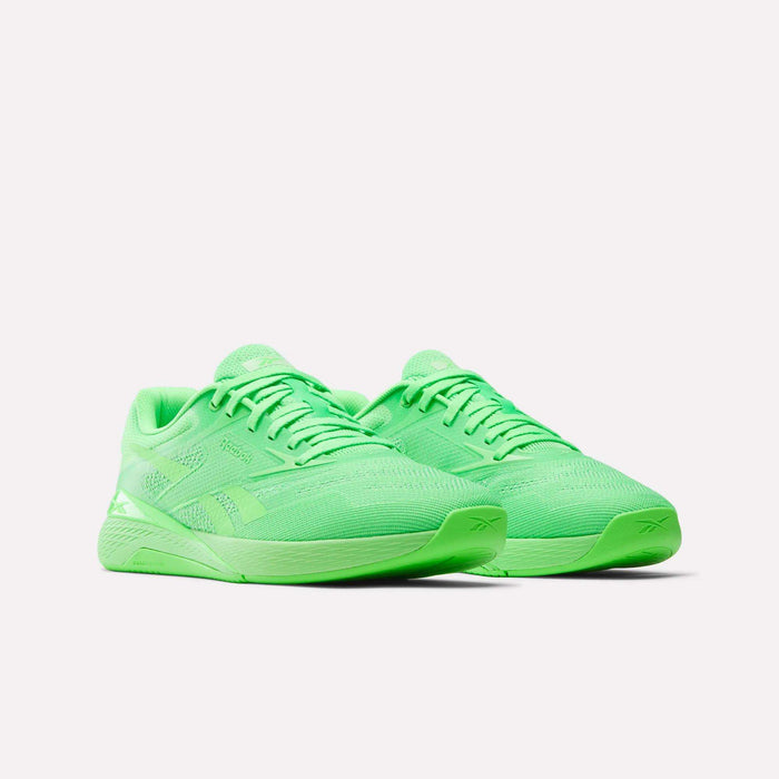 A pair of Reebok Nano X5 Training Shoes in neon green with mesh uppers and matching soles, designed for comfort and performance, displayed on a plain white background.