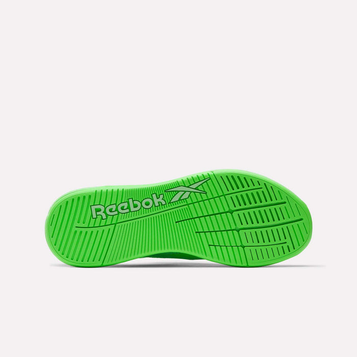 The green sole of the Reebok Nano X5 Training Shoes is shown from below, displaying the Reebok logo and multidirectional tread patterns for grip against a plain white background.