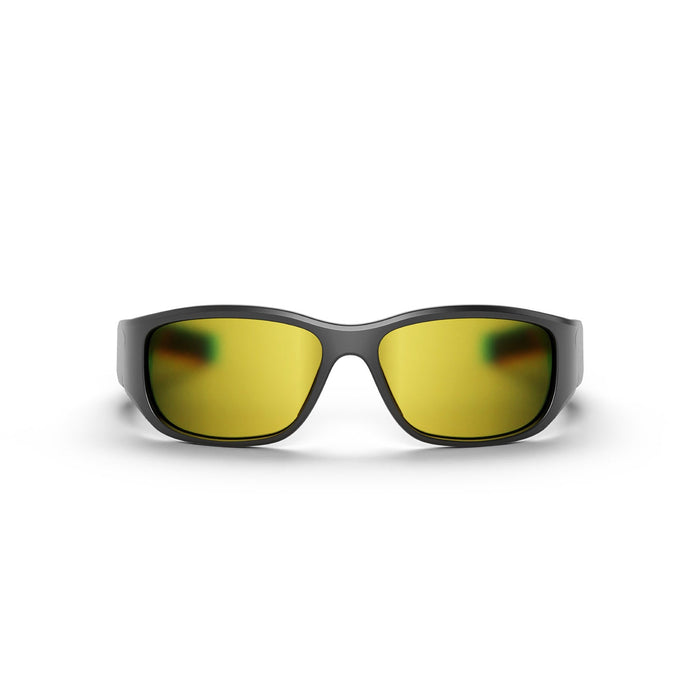 Front view of Reebok Nitrous Smart Audio Sunglasses in black, featuring wide yellow-tinted polarized lenses, shown against a plain white background.