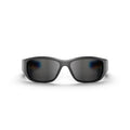 Reebok Nitrous Smart Audio Sunglasses shown front-on against a white background feature wide, wraparound frames and dark polarized lenses, offering full-coverage eye protection with a sleek curved design.