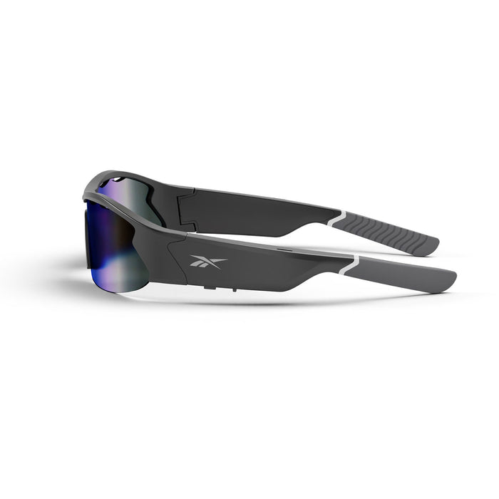 Reebok Octane Smart Audio Sunglasses with a sporty black and gray frame, mirrored lenses, and Bluetooth, folded on a white surface. The Reebok logo appears on the side of the frame.