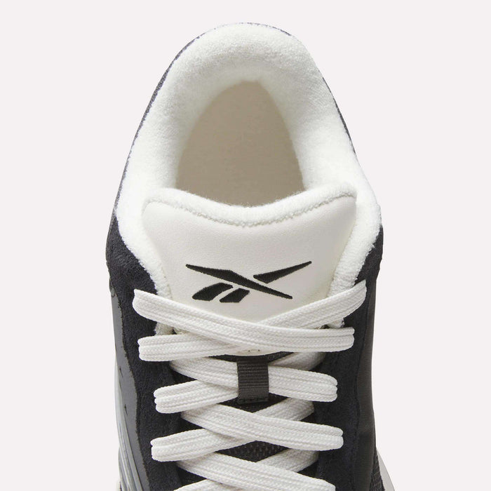 Top view of the Reebok Omni Edge Shoes in black and white, featuring white laces and the Reebok logo on the tongue, crafted from premium materials for a hoops-inspired look that’s perfect for the basketball court.