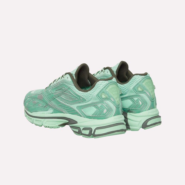 A pair of Reebok Premier Road Ultra Shoes in mint green with gray accents, inspired by archival running silhouettes and featuring a dual-density midsole, displayed from the back and side against a plain white background.