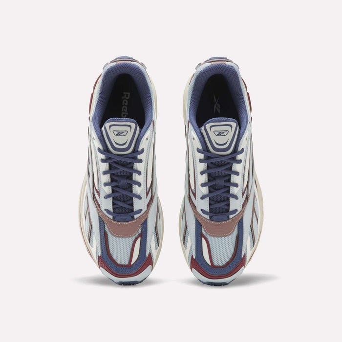 A pair of Reebok Premier Road Ultra SV Shoes, featuring blue, white, and maroon accents in an athletic running sneaker design inspired by the Reebok Premier Road Y2K shoes, viewed from above on a white background.