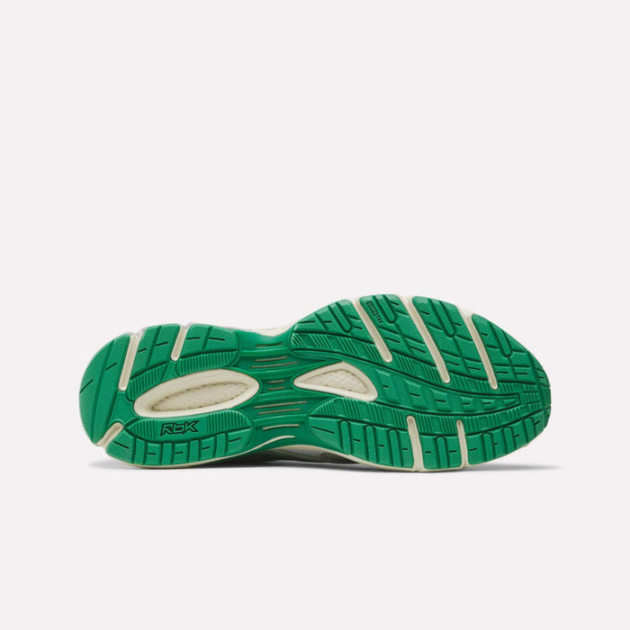 Green and white Reebok Premier Road Ultra SV Shoes sole viewed from below, highlighting tread patterns and grooves engineered for traction and stability—standout features of Y2K-era footwear and essential in high-performance running sneakers.