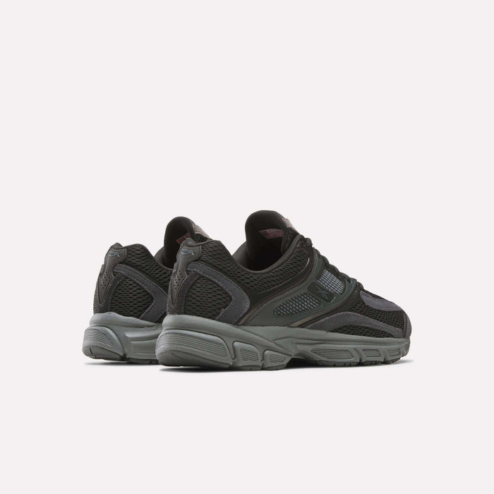 The Reebok Premier Trinity Shoes are stylish black retro runners, ideal for those seeking both comfort and fashion.