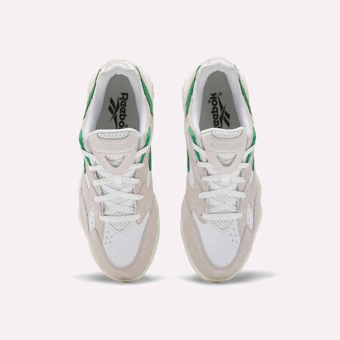 A top view of Reebok Preseason 94 Low Retro Basketball Shoes in white with beige suede and green accents, inspired by '90s athletic styles, displayed on a plain light background.
