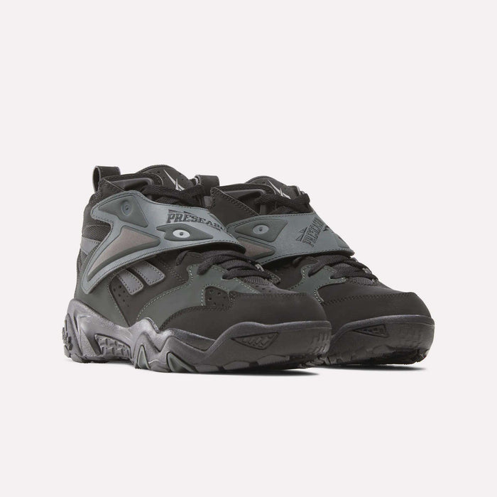 The Reebok Preseason 94 Retro Basketball Shoes in black and dark grey feature chunky soles, mesh and synthetic overlays, and rear pull tabs, shown against a plain white background.