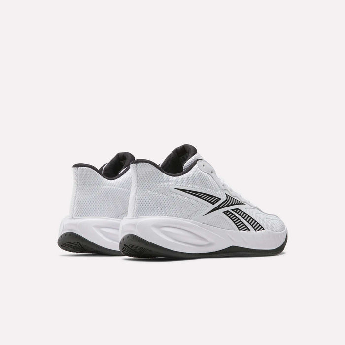 A pair of Reebok Press Basketball Shoes in white with black accents, shown from the back and side on a plain white background—highlighting classic heritage style and EVA cushioning for comfort.
