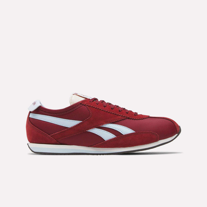 The Reebok R400 Shoes are red athletic sneakers with white and light blue accents, a white heel tab, black outsole, and the Reebok logo on the side, shown against a plain white background.