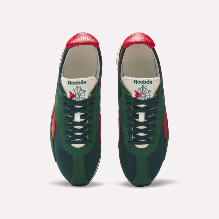 A top view of Reebok R400 Shoes shows green uppers, red accents, and white laces. The Reebok logo appears on the white tongues of these low-profile sneakers.
