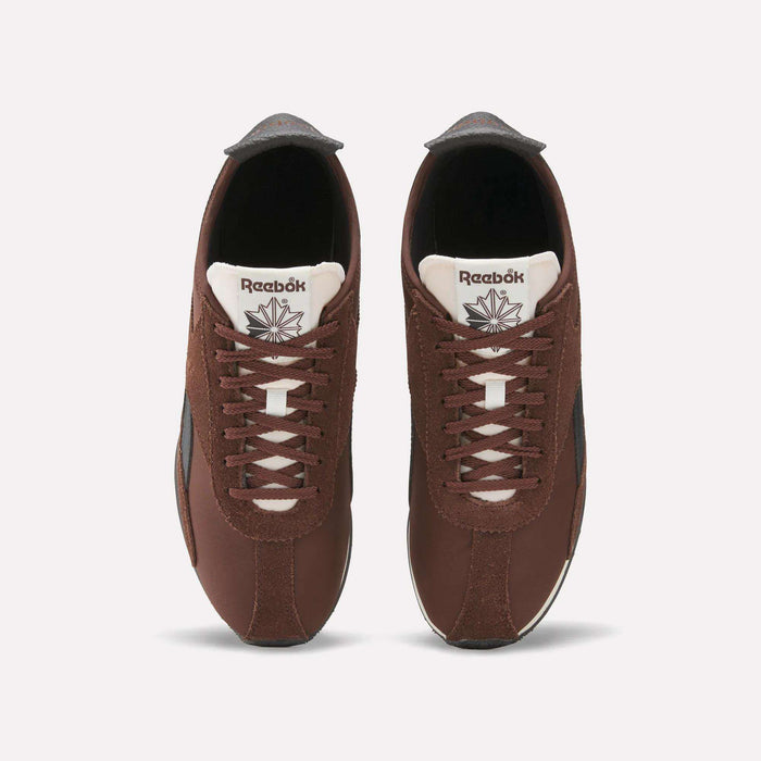 A pair of brown Reebok R400 Shoes with white laces and tongues displaying the Reebok logo, seen from above on a plain light background.