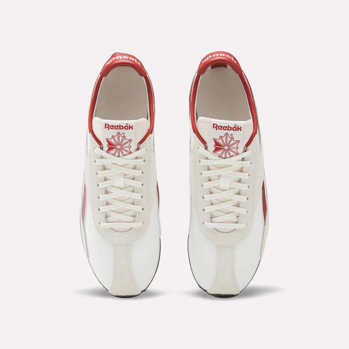 Top view of a pair of Reebok R400 Shoes in white with red accents, featuring white laces and red Reebok logos on the tongue and heel. These vintage Reebok sneakers are placed side by side on a plain background.