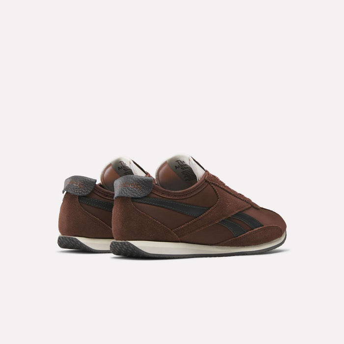 A pair of brown and black Reebok R400 Shoes with retro suede and leather accents, displayed from a rear side angle on a light background.