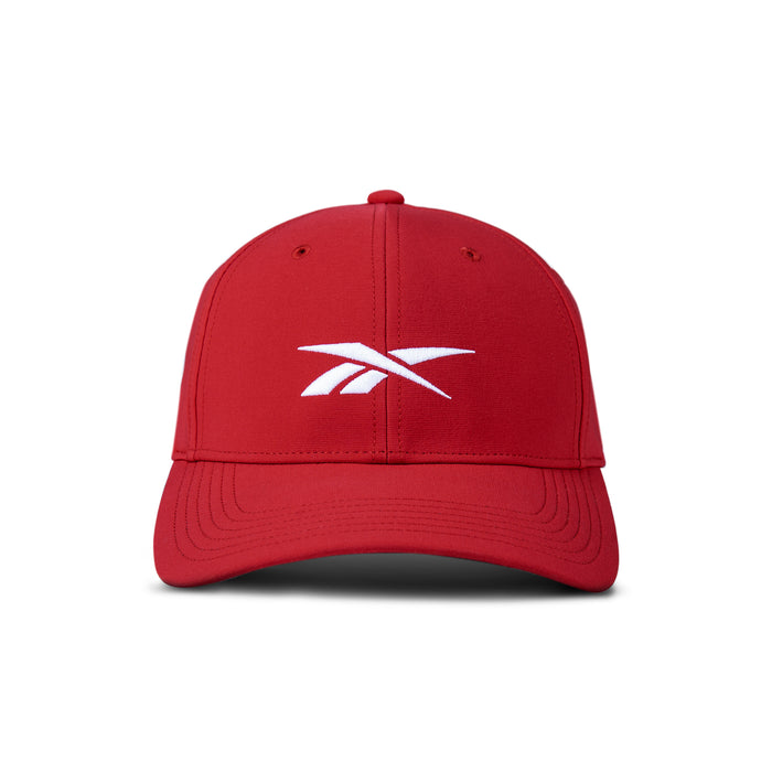 The Reebok Range Cap is a red golf hat with a white logo on the front, featuring moisture-wicking comfort and shown against a plain white background.