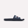 The RBK Fulgere Swim Slides by Reebok in navy blue feature a wide strap with a white logo and red-white vector, displayed in side profile against a plain light background.