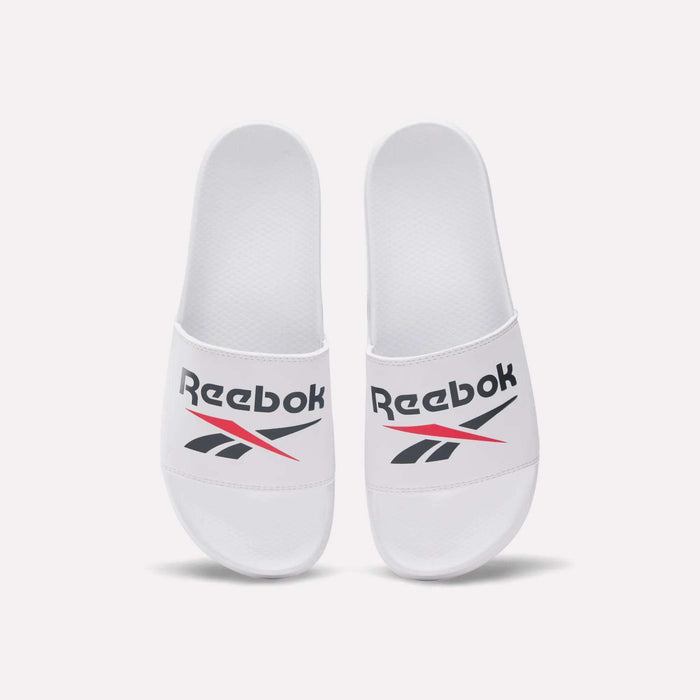 RBK Fulgere Swim Slides by Reebok in white, featuring bold black and red Reebok logos on the slip-on straps, shown side by side on a plain white background.