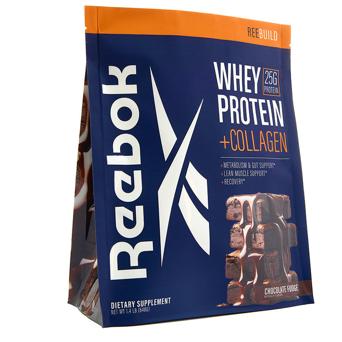 A blue and orange Reebok ReeBuild Whey Protein + Collagen bag in chocolate fudge flavor displays the logo, 25g protein per serving for muscle recovery, and chocolate square images on the front.