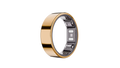 The Reebok Smart Ring by Reebok, shown in gold with a smooth, polished finish and built-in biometric sensors, is displayed against a simple white background.