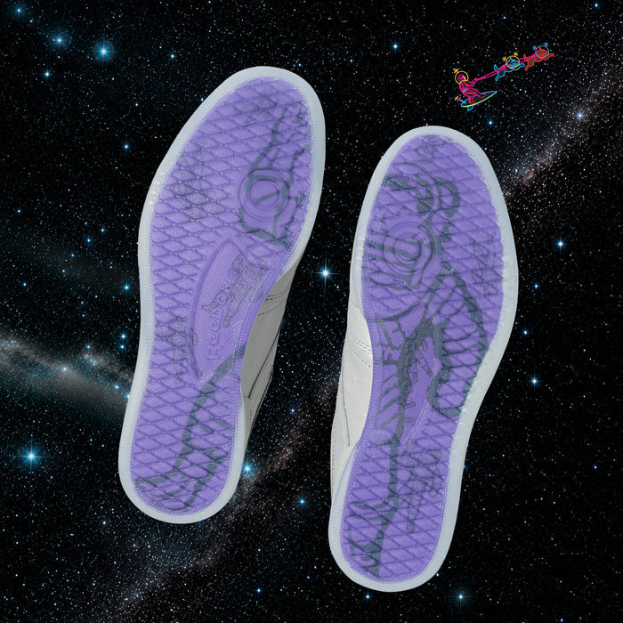 A pair of white Reebok x BBC Club C 85 Shoes with translucent purple soles are shown from the bottom, seemingly floating above a galaxy filled with stars. A small, colorful cartoon figure in the top right corner adds a playful accent to these heritage sneakers by Reebok, which feature a classic tennis silhouette.