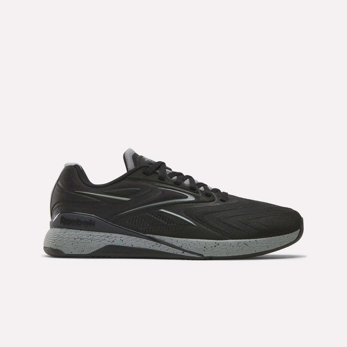 The Reebok x F45 Nano X5 Edge, a black performance training sneaker with a gray speckled sole, is displayed in side profile against a plain white background.