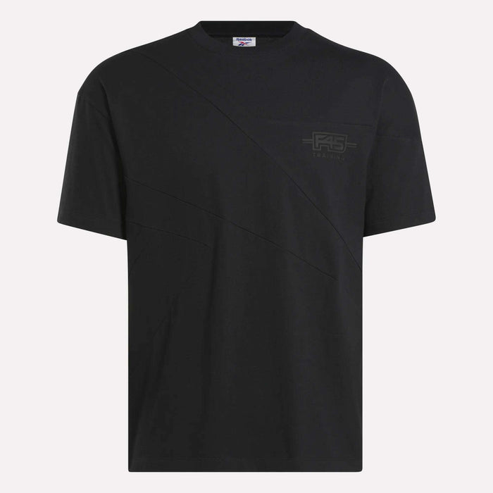 The Reebok x F45 Training Relaxed T-Shirt is a plain black tee with a subtle diagonal seam and small RS logo on the chest, featuring a crew neck and relaxed fit—ideal for workouts or F45 Training sessions.