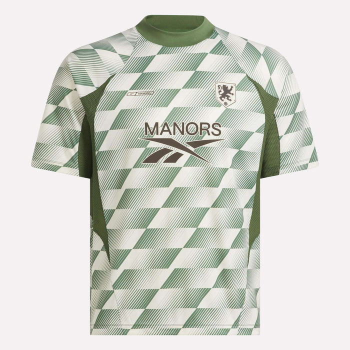 Introducing the Reebok x Manors Men’s Mockneck Polo: a green and white short-sleeve sports jersey featuring a diagonal checker pattern, green collar, MANORS branding and logo on the front, and a small lion crest on the left chest. Designed in collaboration with Reebok and Manors, this jersey is crafted from performance stretch fabric for exceptional comfort and mobility during play.