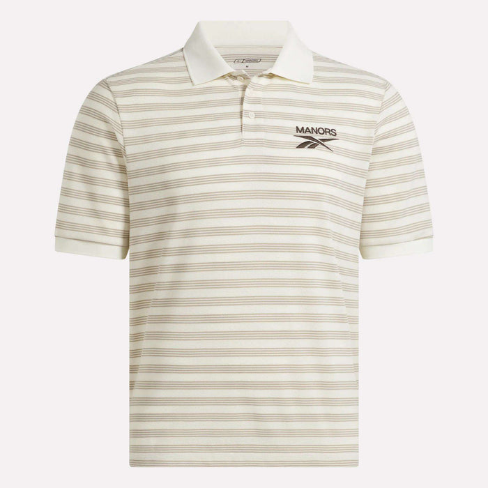 The Reebok x Manors Men’s Pique Polo is a cream-colored short-sleeve golf shirt with thin horizontal beige stripes and a small MANORS logo on the left chest. This classic men’s polo from Reebok features a traditional collar and button placket, blending style and comfort on the course.