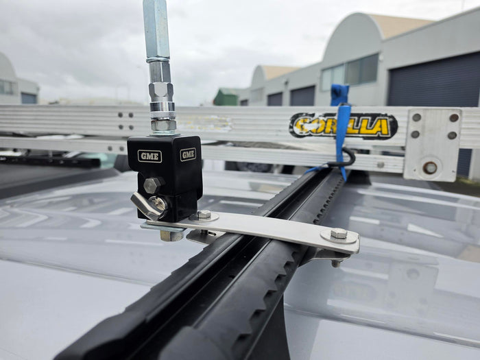 Close-up of a GME roof rack mounting system attached to a vehicle roof