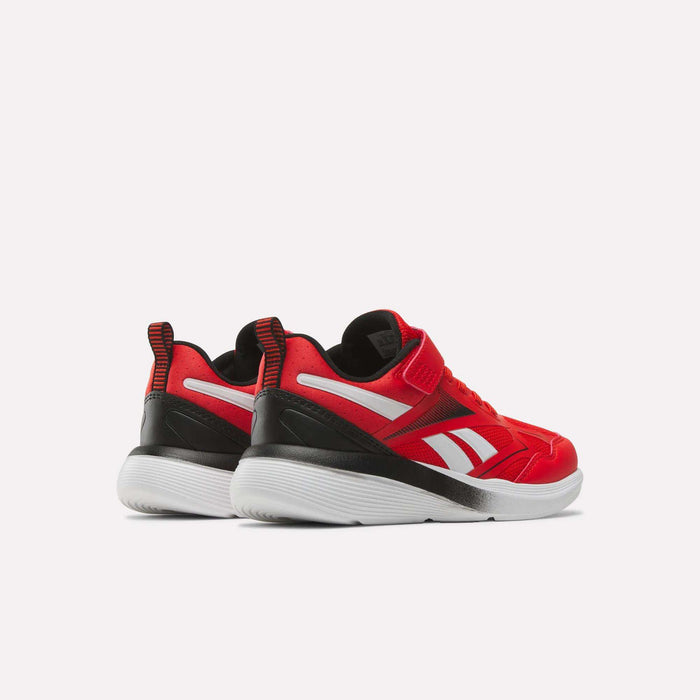 A pair of Reebok Rush Runner 6.0 Elastic Lace Top Strap Running Shoes for little kids in red with white soles and black accents, shown side by side on a plain white background.