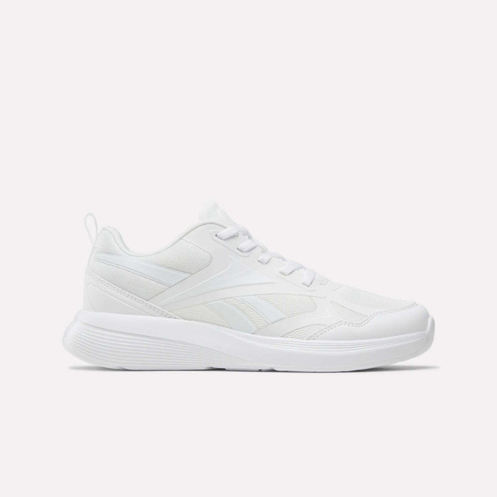 The Reebok Rush Runner 6.0 Running Shoes for big kids feature a mesh and synthetic white upper, white laces, and a textured EVA midsole—ideal for active lifestyles. Shown side profile in White/White/White on a plain background.
