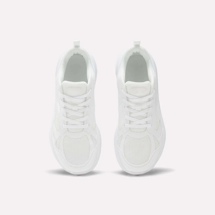 Top view of Reebok Rush Runner 6.0 Running Shoes for big kids, in clean white with white laces, minimalist design, and EVA midsole, placed side by side on a light background.