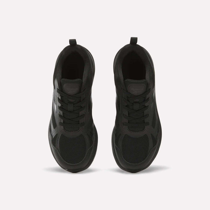 Top view of Reebok Rush Runner 6.0 Running Shoes for Big Kids, black with mesh and synthetic panels, black laces, EVA midsole, and heel pull tabs, placed side by side on a light background.