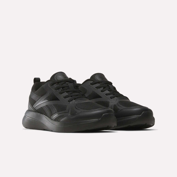 The Reebok Rush Runner 6.0 Running Shoes for big kids are sleek black athletic shoes with mesh panels, thick rubber soles, and an EVA midsole, shown side by side on a plain white background.