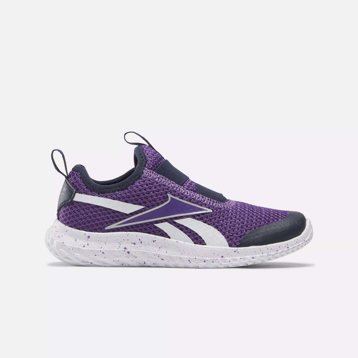 The Reebok Rush Runner Slip-On Shoes for little kids feature Vector Navy, Dynamic Purple, and white colors, a mesh upper, white sole and accents, black toe and heel caps, and a pull tab—perfect stylish running shoes for girls. Displayed on a light background.