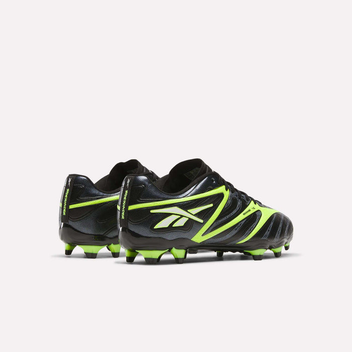 The Reebok Sidewinder 26 League FG Cleats for big kids feature a black design with neon green accents, iconic Reebok logos on the sides, and firm ground studs, shown against a plain white background.