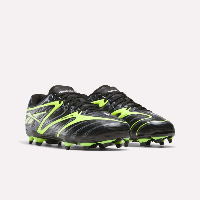 The Reebok Sidewinder 26 League FG Cleats for big kids feature a black and neon yellow striped design with firm ground studs, shown against a white background.